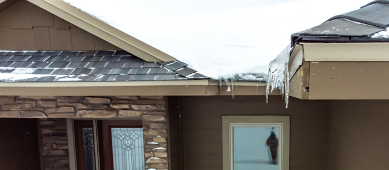 Home with frozen gutters