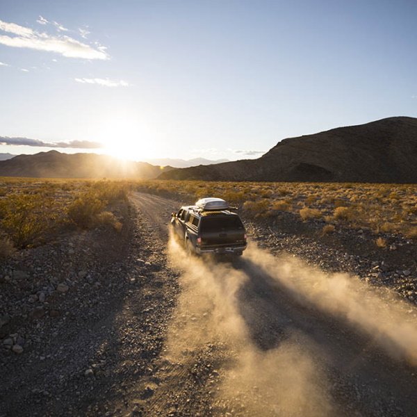 SUV on dirt road